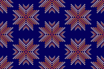 Seamless geometric fabric pattern with African tribal motifs. Hand drawn symmetrical orange stars. Modern ethnic style on blue background.