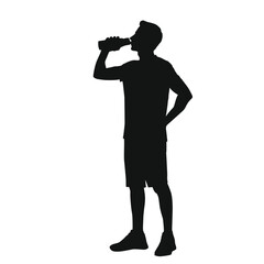 Silhouette of a man drinking water from a bottle