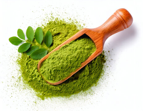 Top view of moringa powder wooden spoon with moringa leaf on white background