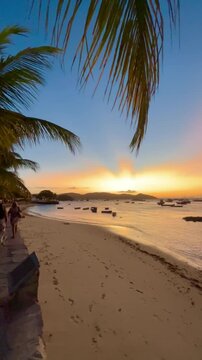 SUNSET ON A PARADISIAC BEACH IN BRAZIL WITH CALM WATERS