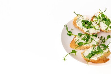 Sandwiches with fresh sprouting microgreens. Sprouted peas seeds micro greens. Vegan food
