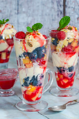 Knickerbocker glory - layered ice cream sundae with fresh fruit
