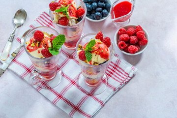 Knickerbocker glory - layered ice cream sundae with fresh fruit