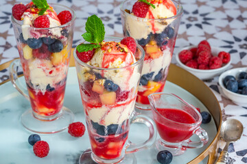 Knickerbocker glory - layered ice cream sundae with fresh fruit