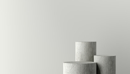 Three concrete cylinders creating a pedestal on a minimal background