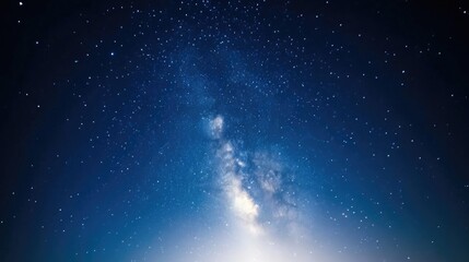 Obraz premium Night Sky Milky Way Galaxy Dramatic Astrophotography High-resolution Wide Angle Shot Celestial Wonders Cosmic Exploration Deep Blue Hues Ideal for Space Themes