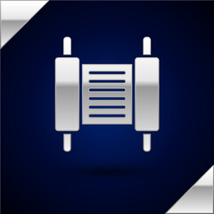 Silver Torah scroll icon isolated on dark blue background. Jewish Torah in expanded form. Star of David symbol. Old parchment scroll. Vector