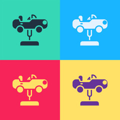 Pop art Swing car on the playground icon isolated on color background. Childrens carousel with car. Amusement icon. Vector