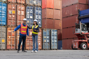 Container logistic shipping, Foreman worker and Industrial engineer women checking loading...