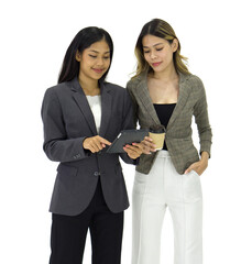 Two dedicated business professional engaged in digital communication via  tablet computer, symbolizing the intertwining of technology and modern business.