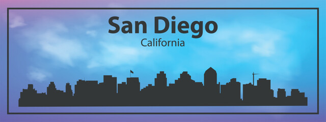 Silhouette of the San Diego skyline, California, USA. The view of the city skyline is set against a blue sky with a purple gradient, which creates an atmosphere of calm and evening comfort.