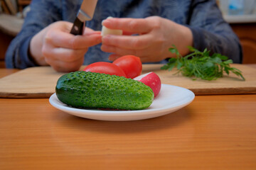 Preparing fresh vegetables for a vibrant salad