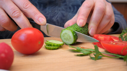 Chopping veggies for a fresh salad