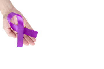 Purple satin ribbon on the palm of a woman, isolated background. Cancer awareness symbol, epilepsy. copy space.