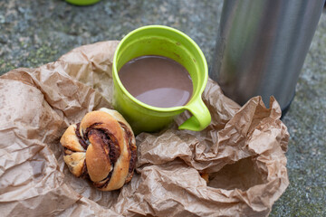 cup of tea and cinnamon bun 