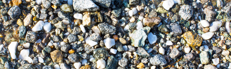 Background with small stones under water