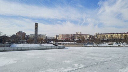Orel city in winter. Confluence of Oka and Orlik rivers. View of Strelka and memorial complex "400 years of Orel city". Winter urban landscape. Frozen rivers covered with ice. Beautiful Russian city