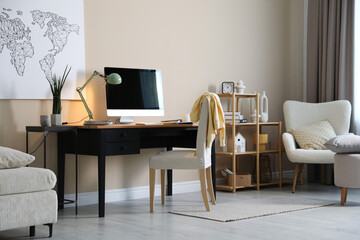 Comfortable workplace with modern computer in home office