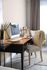 Comfortable workplace with modern computer in home office