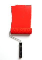 Obraz premium Paint roller in paint isolated on a white