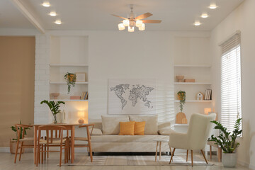 Beautiful furniture and decor in cozy living room. Interior design