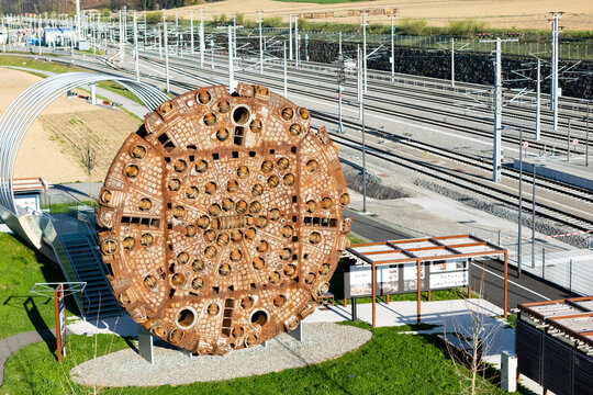 Deutschlandsberg, Austria - April 6, 2025: Huge tunnel drilling machine as memorial for construction works for the new Koralmbahn. Weststeiermark train station at the Koralmbahn railroad track