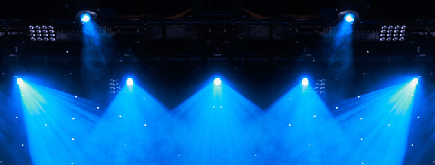 Scene, stage light with colored spotlights. Theater lights spotlights over the stage, texture...