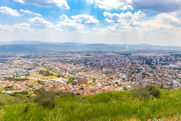 Fototapeta premium Wide angle shot of Bergama(pergamon) city center with iconic houses and Red Hall Basilica.