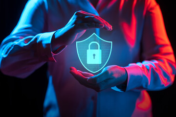 Businessperson showing a security icon on his hand. Technology innovation on a virtual screen. Concept of Cybersecurity, data protection, digital information privacy, and virus defence
