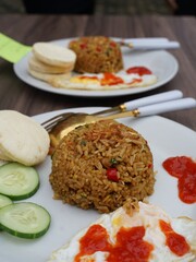 Indonesian fried rice creations with various delicious and nutritious fillings