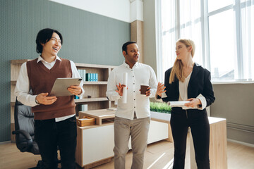 Multicultural businesspeople discussing new project in modern office