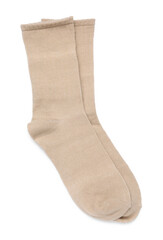 Pair of beige socks isolated on white, top view