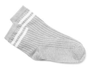 Pair of grey socks isolated on white, top view