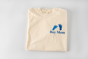 a sweater designed with a baby's first footprints.