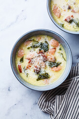 Zuppa toscana soup with sausage, bacon and potatoes.