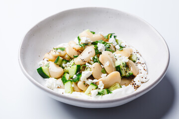 Butter bean salad with yogurt, cucumber and feta.