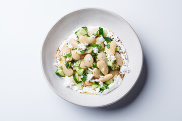 Butter bean salad with yogurt, cucumber and feta.