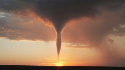 Fototapeta premium Spectacular sunset with a tornado forming in the sky, capturing the raw power and beauty of nature.