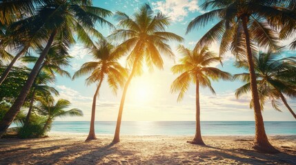 Obraz premium Breathtaking tropical beach at sunrise, golden light reflecting on the calm azure sea, surrounded by tall palm trees.