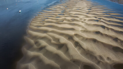 Texture and ridges on sandbank at low tide