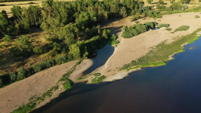 The sandbanks of the Loire in a typical rural setting in Europe, in France, in Burgundy, in Nievre, in summer, during a stormy day.&nbsp;