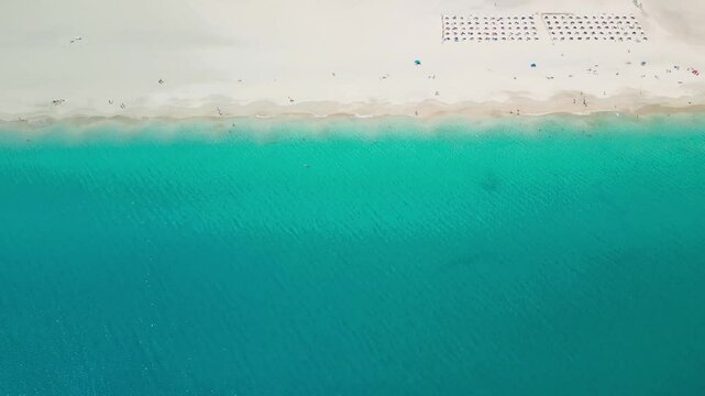White sandy beach and blue water in Morro Jable, south of Fuerteventura, Canary islands