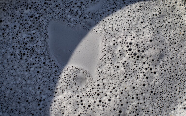 White foam in a bucket