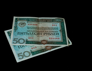 USSR government loan bonds lying on table