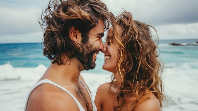 Love's warmth, captured in a seaside hug. Close-up portrait of a loving couple embracing on the beach.