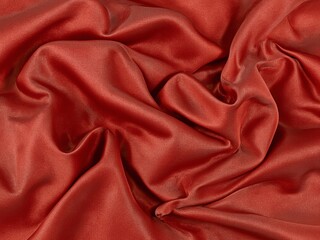 Red silk fabric, smooth soft glossy.