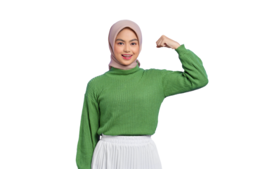 Beautiful smiling Asian woman in green sweater raises arms and shows biceps, demonstrated her achievement after training in a gym isolated on transparent background