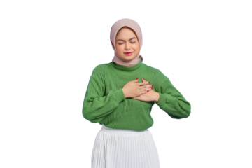 Beautiful young Asian woman in green sweater presses a hand to chests has heart attack suffer from unbearable pain closes eyes isolated on transparent background