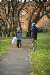 Fototapeta premium Children running on park pathway.