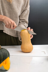 Preparing butternut squash in kitchen setting for autumn recipes and cooking inspiration
